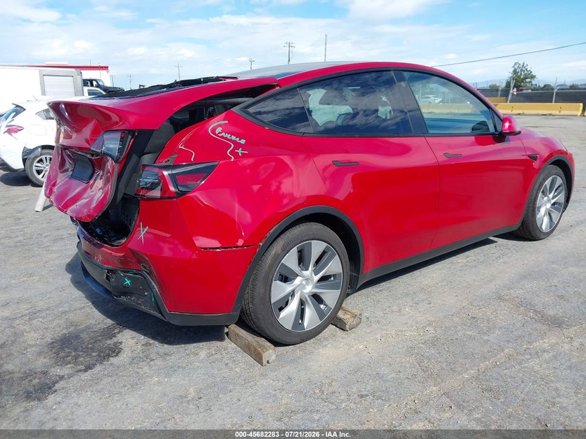 2022 Tesla Model y VIN 7SAYGDEE6NF368964 IAAI salvage auction — REAR END, Salvage Title, sold $7,600 on 2026-08-01 (photo 4)