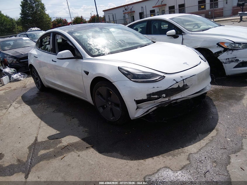 2022 Tesla Model 3 VIN 5YJ3E1EA1NF320264 IAAI salvage auction — FRONT & REAR, Wait Title, sold $6,850 on 2026-09-21 (photo 1)