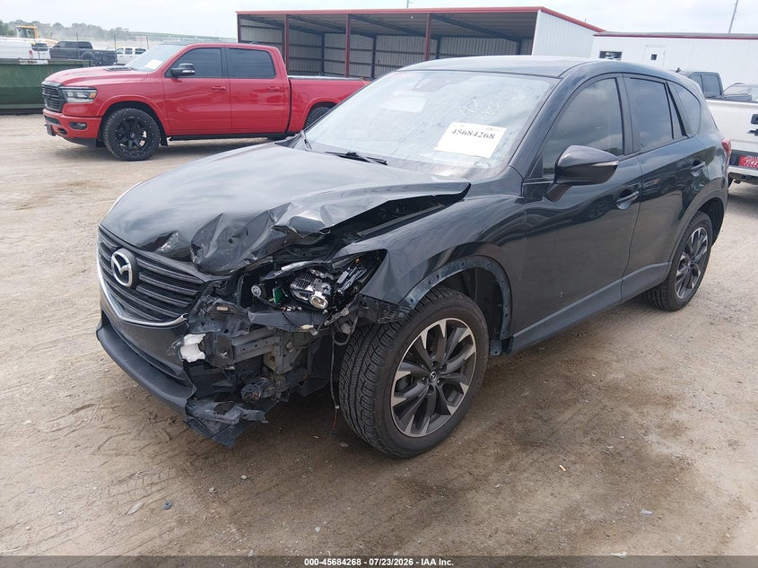 2016 Mazda Cx-5 VIN JM3KE4DY1G0784482 IAAI salvage auction — LEFT FRONT, Salvage Title, sold $2,000 on 2026-09-26 (photo 2)