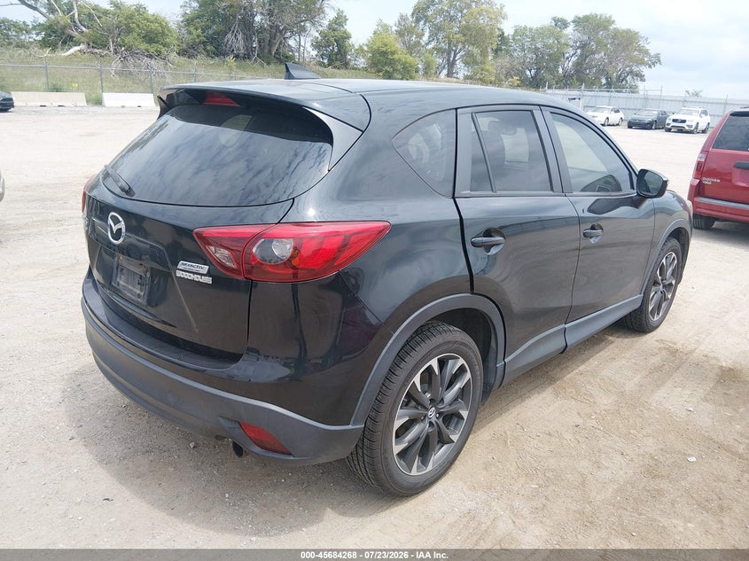 2016 Mazda Cx-5 VIN JM3KE4DY1G0784482 IAAI salvage auction — LEFT FRONT, Salvage Title, sold $2,000 on 2026-09-26 (photo 4)