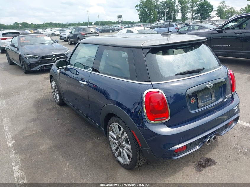 2017 Mini Hard top VIN WMWXP7C31H3C62015 IAAI salvage auction — WATER/FLOOD, Salvage Title, sold $2,750 on 2026-08-17 (photo 3)