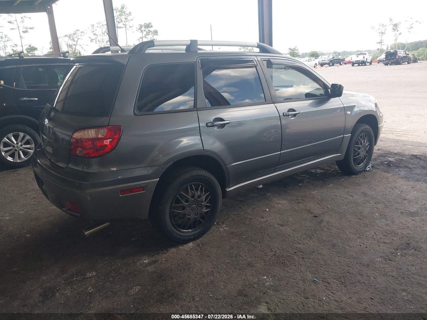 2006 Mitsubishi Outlander VIN JA4LX31FX6U051269 IAAI salvage auction — NORMAL WEAR, Clear (Florida), sold $25 on 2026-07-28 (photo 4)