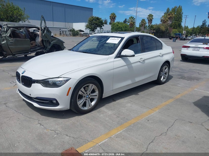 2017 BMW 3er VIN WBA8B9G51HNU49296 IAAI salvage auction — REAR END, Salvage Title, sold $2,450 on 2026-08-17 (photo 2)