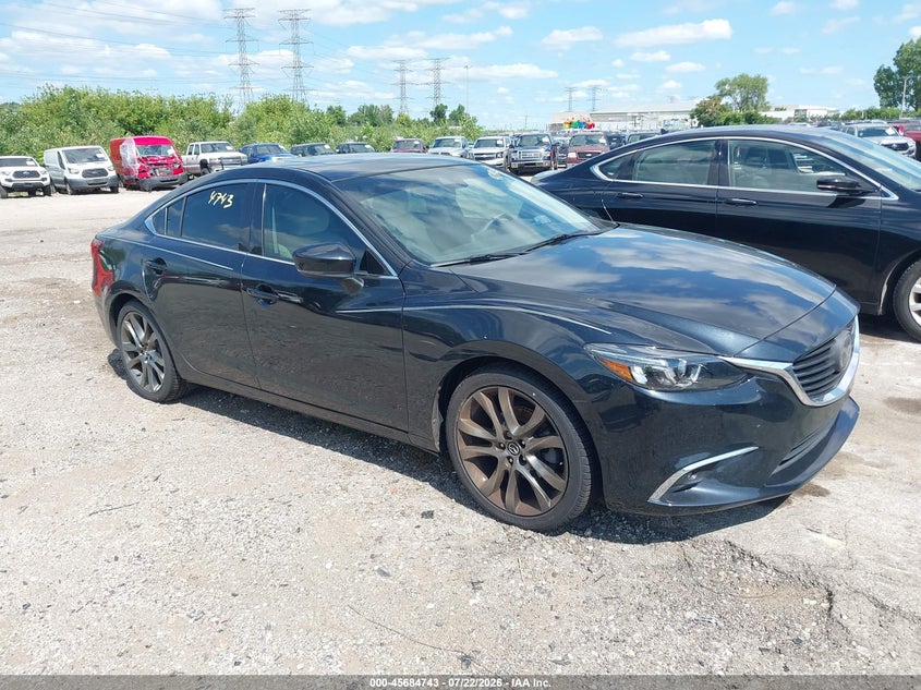 2017 Mazda 6 VIN JM1GL1W58H1104546 IAAI salvage auction — WATER/FLOOD, Salvage (Illinois), sold $2,000 on 2026-09-10 (photo 1)