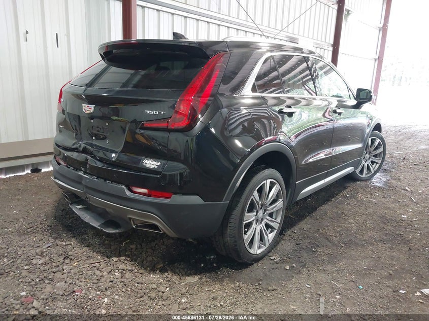2023 Cadillac Xt4 VIN 1GYFZDR40PF213948 IAAI salvage auction — REAR END, Salvage Title, sold $7,400 on 2026-09-04 (photo 4)