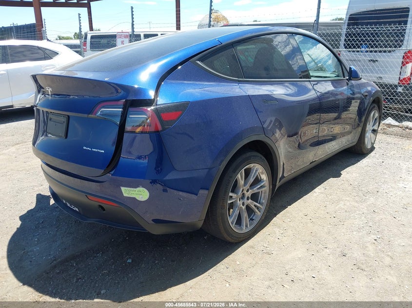 2023 Tesla Model y VIN 7SAYGDEE3PF854344 IAAI salvage auction — REAR END, Salvage (California), sold $10,700 on 2026-08-24 (photo 4)