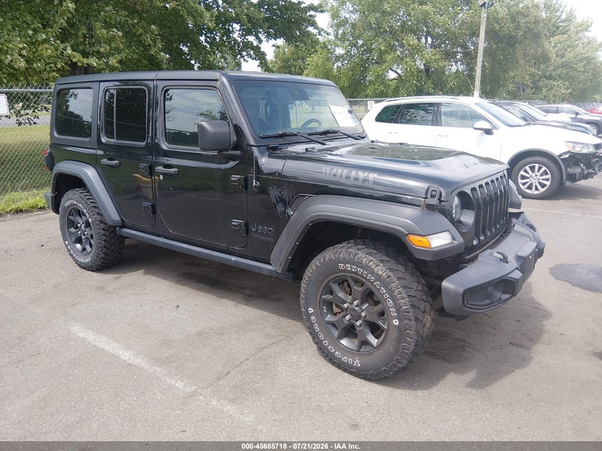 2021 Jeep Wrangler / VIN 1C4HJXDG0MW573211 — IAAI salvage auction photo