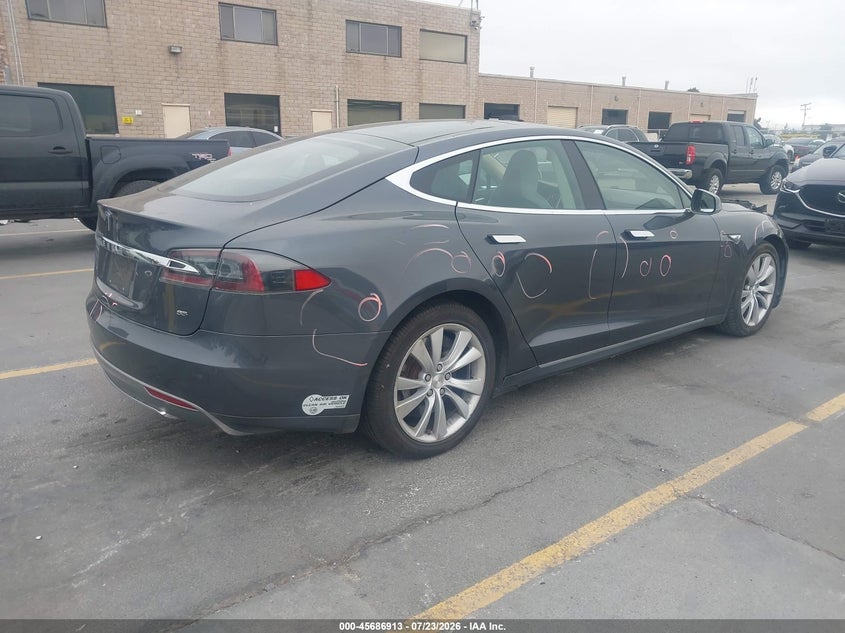 2014 Tesla Model s VIN 5YJSA1H17EFP62257 IAAI salvage auction — LEFT REAR, Wait Title, sold $2,450 on 2026-08-03 (photo 4)