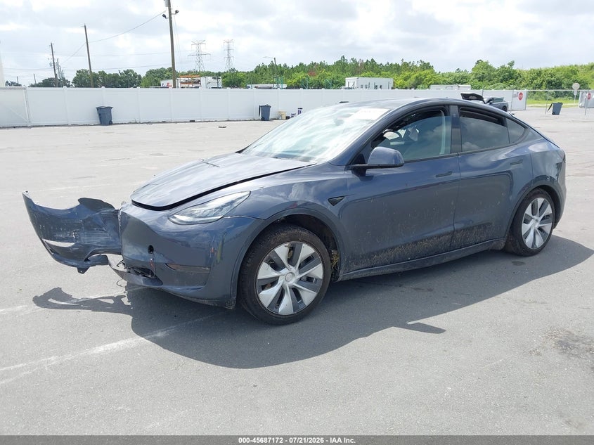 2023 Tesla Model y VIN 7SAYGDEE1PA038858 IAAI salvage auction — ROLLOVER, Salvage Title, sold $4,600 on 2026-08-02 (photo 2)