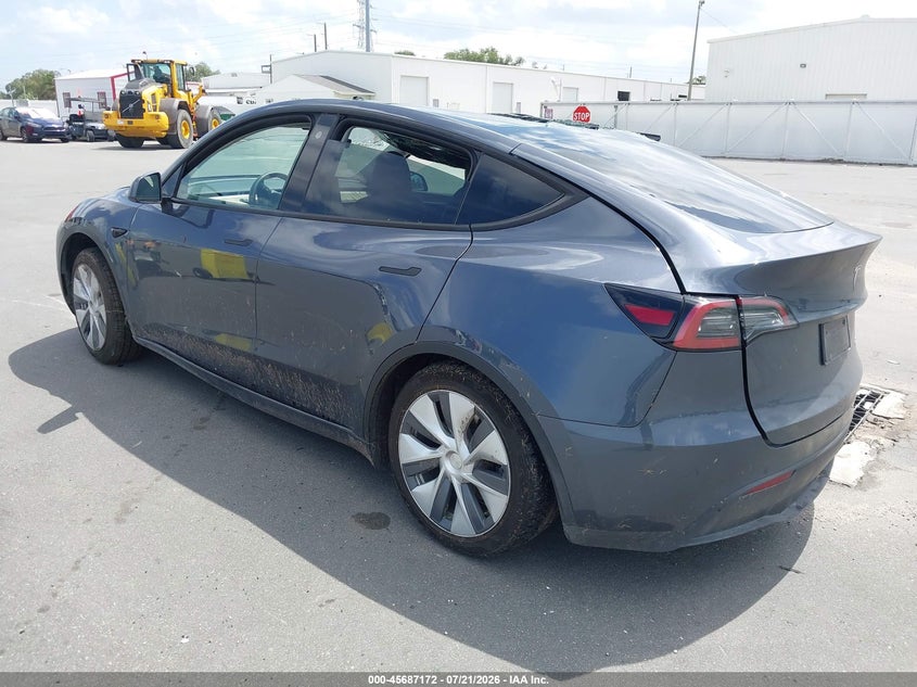 2023 Tesla Model y VIN 7SAYGDEE1PA038858 IAAI salvage auction — ROLLOVER, Salvage Title, sold $4,600 on 2026-08-02 (photo 3)