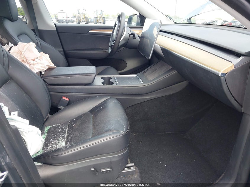 2023 Tesla Model y VIN 7SAYGDEE1PA038858 IAAI salvage auction — ROLLOVER, Salvage Title, sold $4,600 on 2026-08-02 (photo 5)