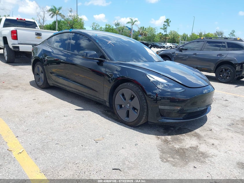 2023 Tesla Model 3 VIN 5YJ3E1EA4PF625244 — IAAI salvage auction photo