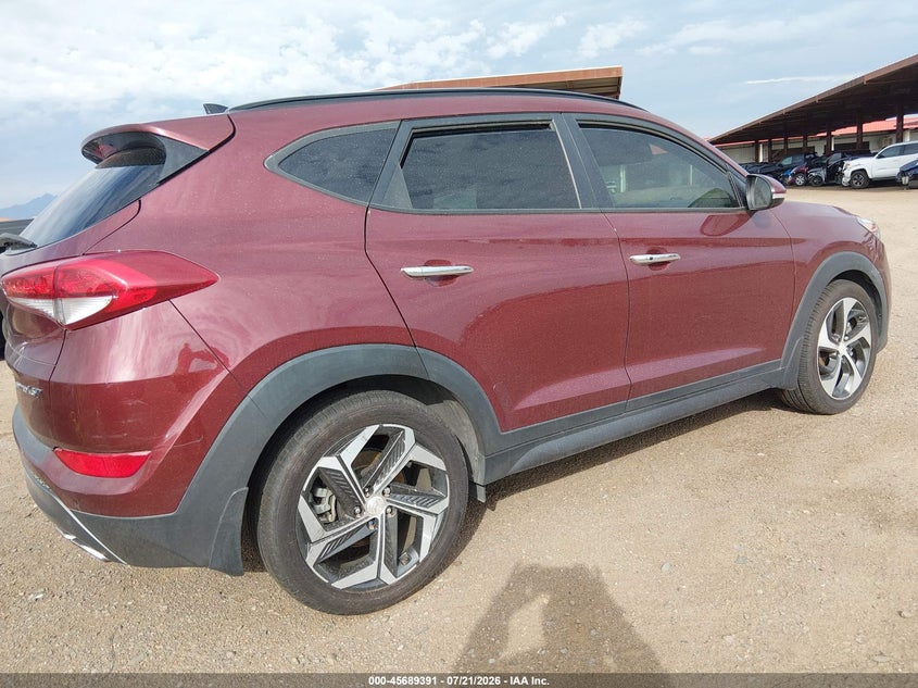 2016 Hyundai Tucson VIN KM8J33A2XGU159698 IAAI salvage auction — NORMAL WEAR, Clear-Dealer Only (Arizona), sold $200 on 2026-07-28 (photo 4)