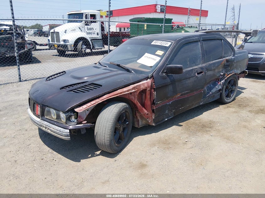 1995 BMW 3 series VIN WBACB3325SFE21458 IAAI salvage auction — NORMAL WEAR, Salvage (Arkansas), sold $25 on 2026-07-29 (photo 2)