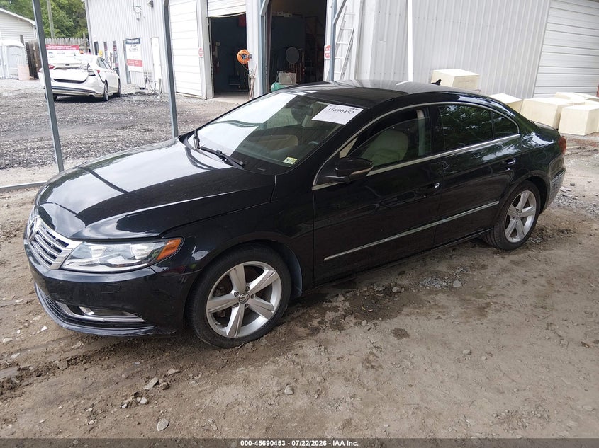 2013 Volkswagen Passat cc VIN WVWBP7ANXDE557997 IAAI salvage auction — NORMAL WEAR, Clear (Virginia), sold $25 on 2026-07-28 (photo 2)
