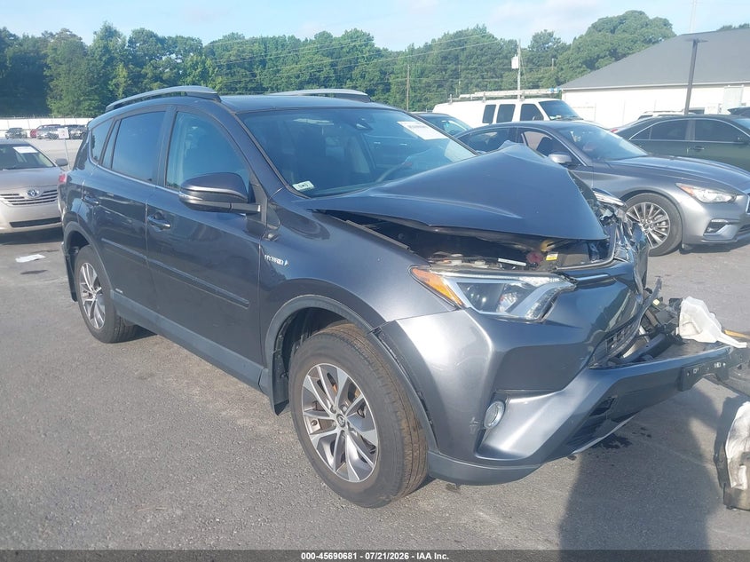 2018 Toyota Rav4 hybrid VIN JTMRJREV2JD207383 — IAAI salvage auction photo