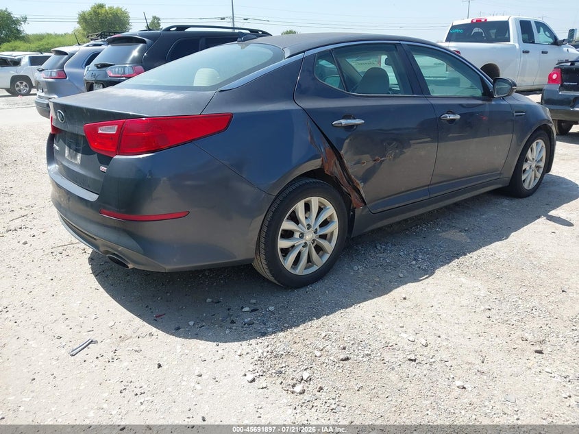 2015 Kia Optima VIN 5XXGM4A71FG507678 IAAI salvage auction — NORMAL WEAR, Salvage Title, sold $25 on 2026-07-29 (photo 4)