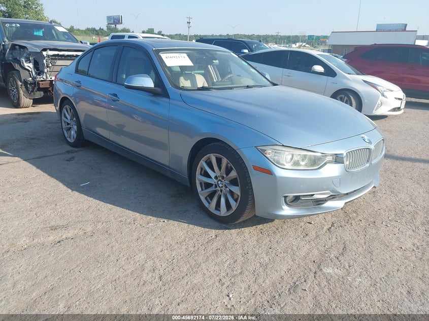 2012 BMW 3er VIN WBA3A5C59CF348067 IAAI salvage auction — REAR END, Salvage Title, sold $1,000 on 2026-08-23 (photo 1)