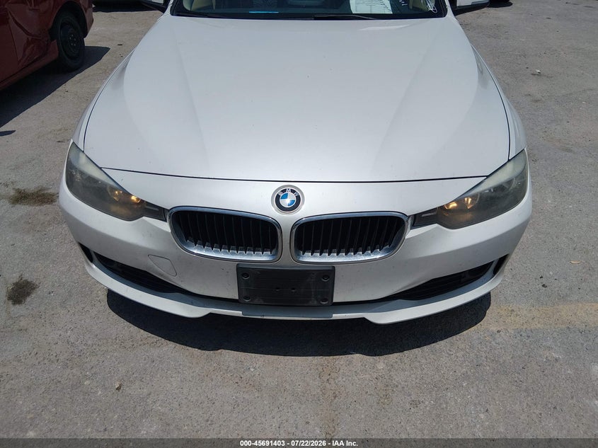 2013 BMW 3 series VIN WBA3B1C50DF461817 IAAI salvage auction — NORMAL WEAR, Original (Texas), sold $1,750 on 2026-08-10 (photo 6)