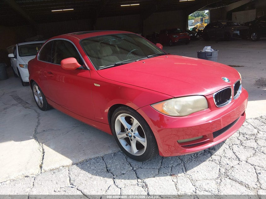2011 BMW 1 series VIN WBAUP7C52BVK78415 IAAI salvage auction — NORMAL WEAR, Clear (Indiana), sold $2,075 on 2026-08-03 (photo 1)