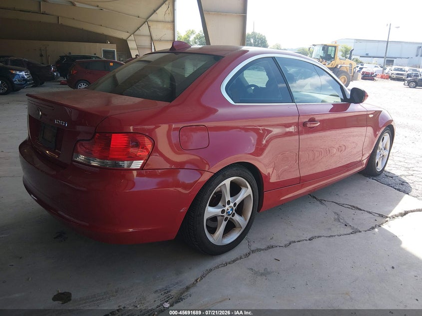 2011 BMW 1 series VIN WBAUP7C52BVK78415 IAAI salvage auction — NORMAL WEAR, Clear (Indiana), sold $2,075 on 2026-08-03 (photo 4)