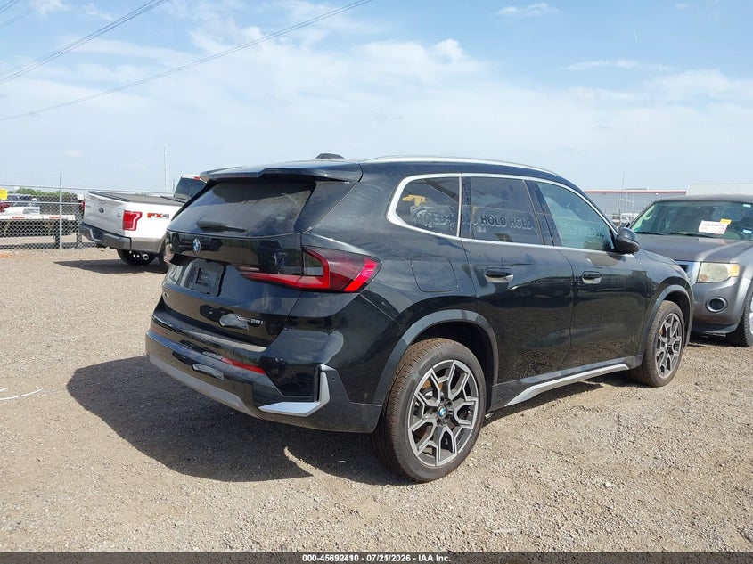 2026 BMW X1 VIN WBX73EF02T5400663 IAAI salvage auction — SIDE, Salvage Title, sold $19,300 on 2026-10-01 (photo 4)