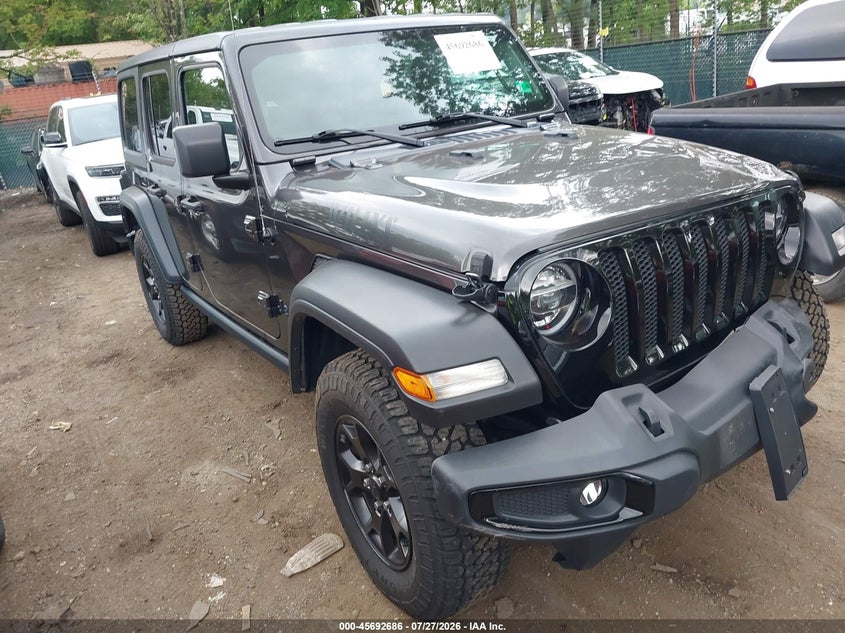 2021 Jeep Wrangler / VIN 1C4HJXDN3MW521926 — IAAI salvage auction photo