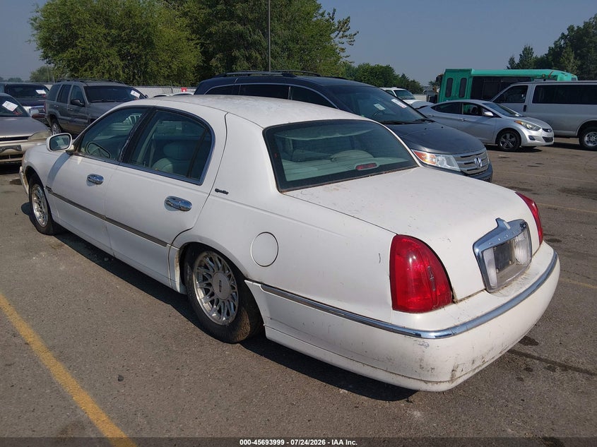 1998 Lincoln TOWN CAR VIN 1LNFM82W3WY676298 IAAI salvage auction — NORMAL WEAR, Clear (Idaho), sold $150 on 2026-07-31 (photo 3)