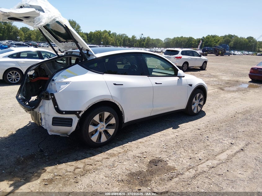 2023 Tesla Model y VIN 7SAYGAEE5PF703083 IAAI salvage auction — REAR END, Salvage (Pennsylvania), sold $25 on 2026-08-01 (photo 4)