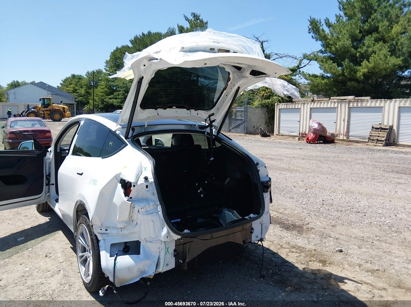 2023 Tesla Model y VIN 7SAYGAEE5PF703083 IAAI salvage auction — REAR END, Salvage (Pennsylvania), sold $25 on 2026-08-01 (photo 6)