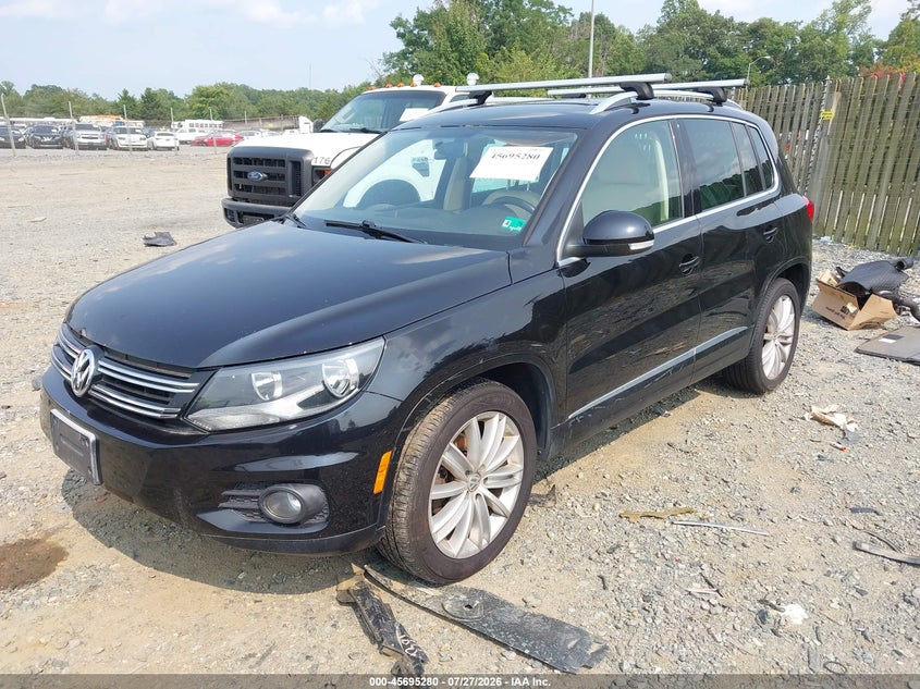 2013 Volkswagen Tiguan VIN WVGBV7AX8DW519391 IAAI salvage auction — NORMAL WEAR, Clear (Virginia), sold $200 on 2026-08-03 (photo 2)