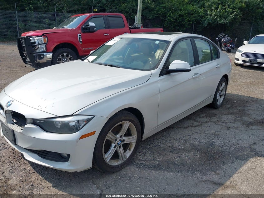2013 BMW 3 series VIN WBA3B3C54DF530648 IAAI salvage auction — NORMAL WEAR, Regular (South Dakota), sold $800 on 2026-07-24 (photo 2)