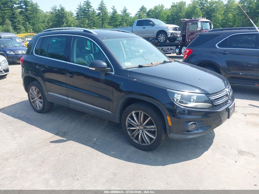 2014 Volkswagen Tiguan VIN WVGBV3AX4EW562121 IAAI salvage auction — NORMAL WEAR, Wait Title, sold $425 on 2026-08-07 (photo 1)