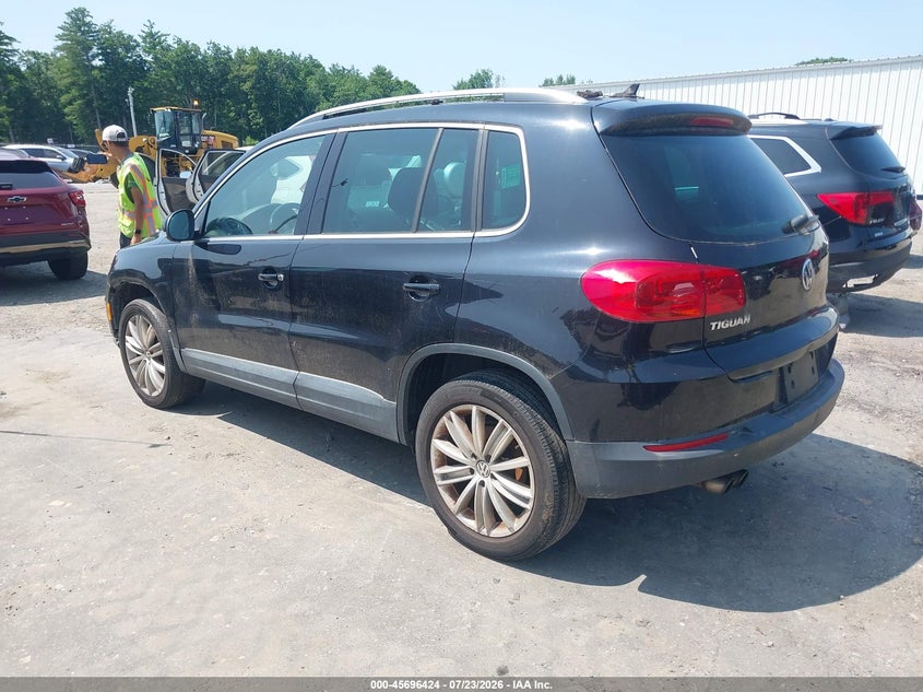 2014 Volkswagen Tiguan VIN WVGBV3AX4EW562121 IAAI salvage auction — NORMAL WEAR, Wait Title, sold $425 on 2026-08-07 (photo 3)