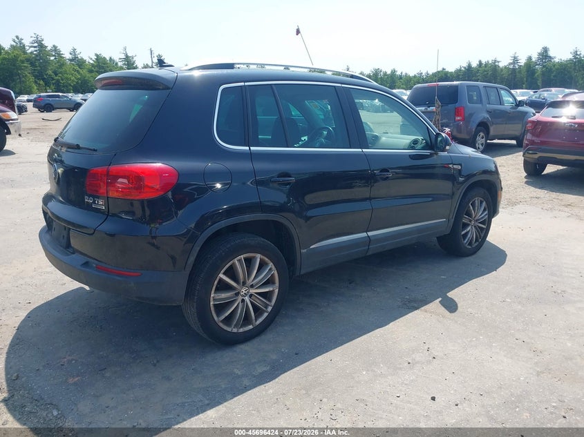 2014 Volkswagen Tiguan VIN WVGBV3AX4EW562121 IAAI salvage auction — NORMAL WEAR, Wait Title, sold $425 on 2026-08-07 (photo 4)