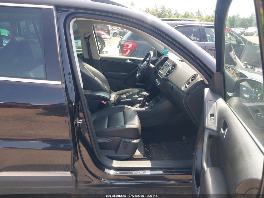2014 Volkswagen Tiguan VIN WVGBV3AX4EW562121 IAAI salvage auction — NORMAL WEAR, Wait Title, sold $425 on 2026-08-07 (photo 5)