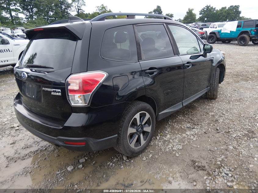 2017 Subaru Forester VIN JF2SJADC1HH437164 IAAI salvage auction — SIDE, Wait Title, sold $575 on 2026-10-01 (photo 4)