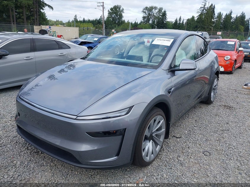2026 Tesla Model y VIN 7SAYGDEE5TF454781 IAAI salvage auction — REAR END, Salvage Title, sold $25,250 on 2026-08-28 (photo 2)