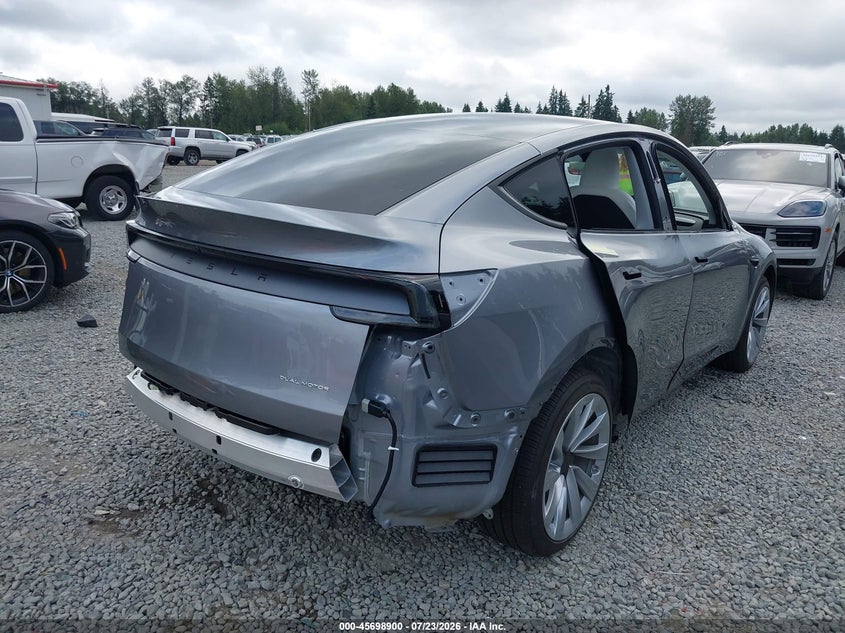 2026 Tesla Model y VIN 7SAYGDEE5TF454781 IAAI salvage auction — REAR END, Salvage Title, sold $25,250 on 2026-08-28 (photo 4)