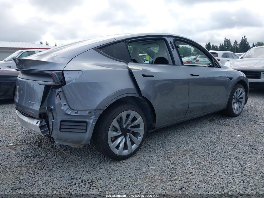 2026 Tesla Model y VIN 7SAYGDEE5TF454781 IAAI salvage auction — REAR END, Salvage Title, sold $25,250 on 2026-08-28 (photo 6)
