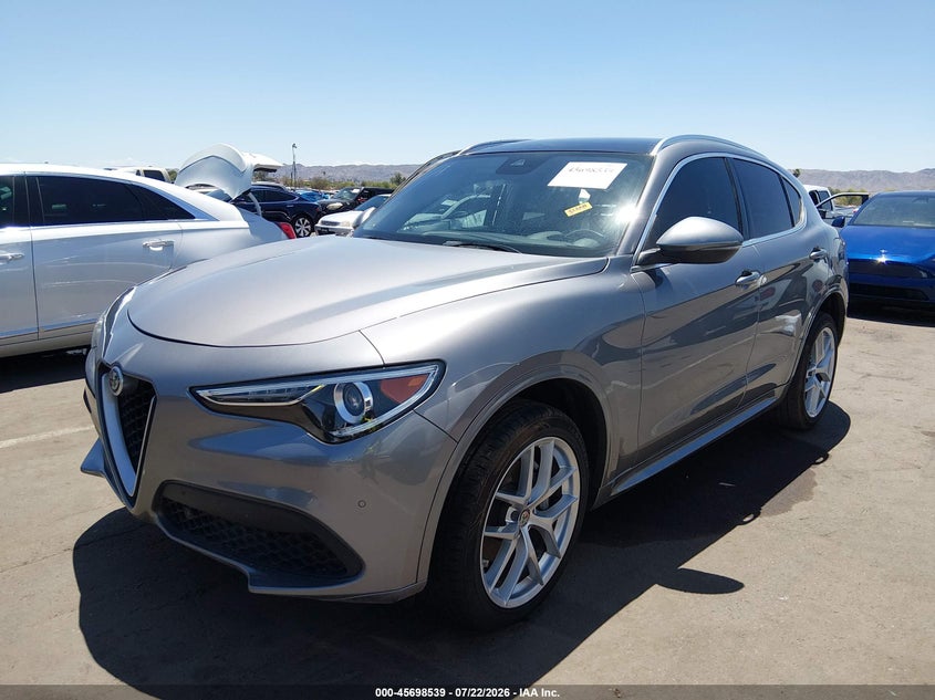 2021 Alfa romeo Stelvio VIN ZASPAKBN9M7D09731 IAAI salvage auction — SIDE, Wait Title, sold $1,150 on 2026-08-18 (photo 2)