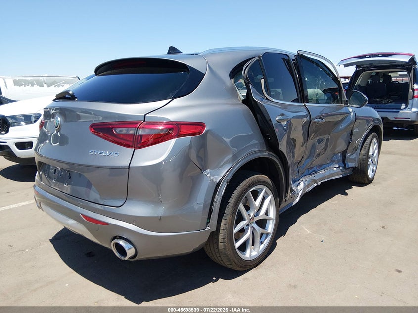 2021 Alfa romeo Stelvio VIN ZASPAKBN9M7D09731 IAAI salvage auction — SIDE, Wait Title, sold $1,150 on 2026-08-18 (photo 4)