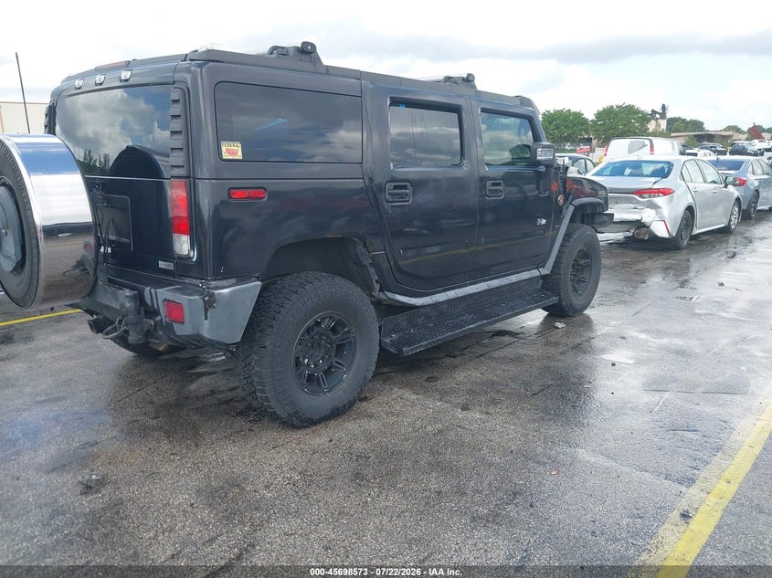 2006 Hummer H2 VIN 5GRGN23U56H115857 IAAI salvage auction — NORMAL WEAR, Clear (Florida), sold $25 on 2026-07-30 (photo 4)