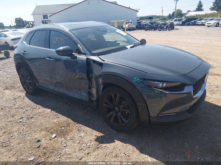 2023 Mazda Cx-30 VIN 3MVDMBDY9PM573244 IAAI salvage auction — SIDE, Salvage Title, sold $6,100 on 2026-08-23 (photo 1)