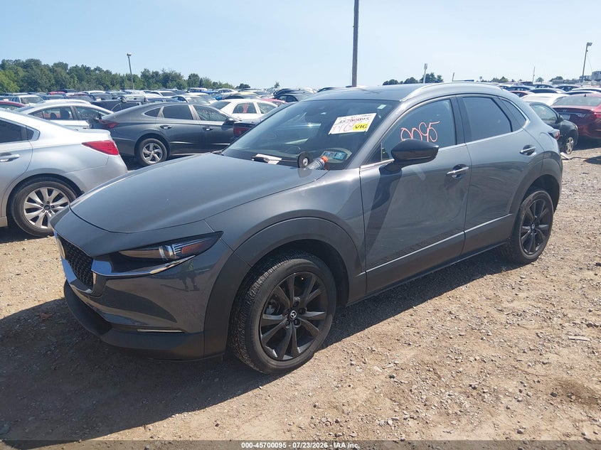 2023 Mazda Cx-30 VIN 3MVDMBDY9PM573244 IAAI salvage auction — SIDE, Salvage Title, sold $6,100 on 2026-08-23 (photo 2)