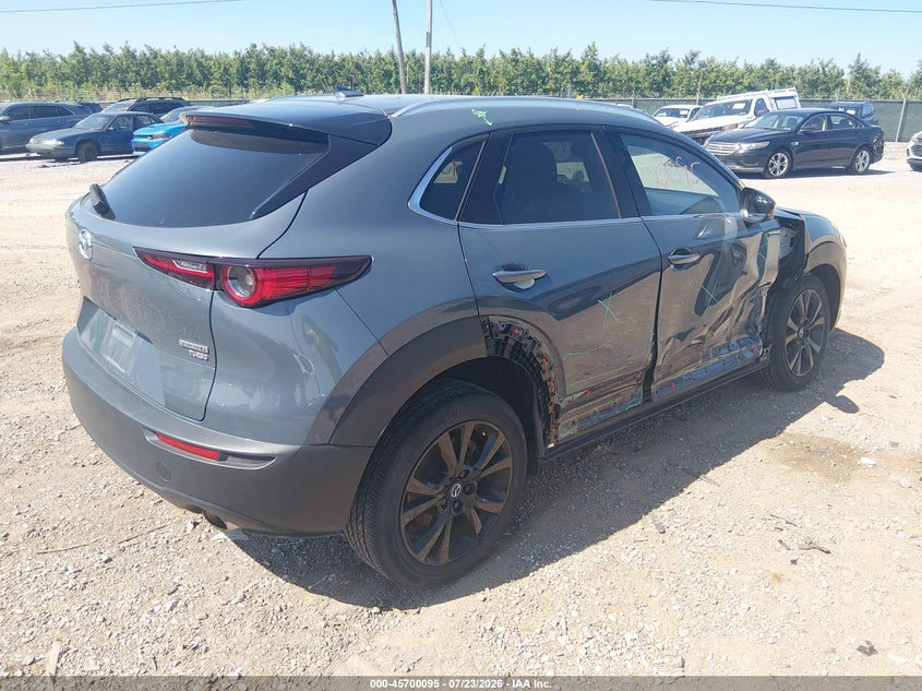 2023 Mazda Cx-30 VIN 3MVDMBDY9PM573244 IAAI salvage auction — SIDE, Salvage Title, sold $6,100 on 2026-08-23 (photo 4)