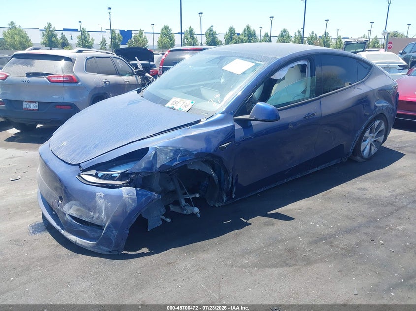 2023 Tesla Model y VIN 7SAYGDED7PF955961 IAAI salvage auction — LEFT SIDE, Wait Title, sold $4,600 on 2026-09-07 (photo 2)