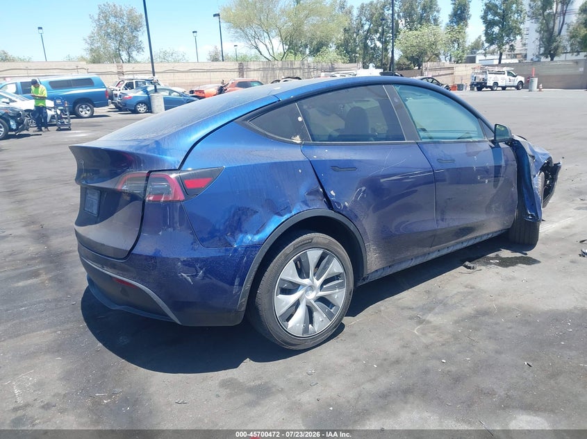 2023 Tesla Model y VIN 7SAYGDED7PF955961 IAAI salvage auction — LEFT SIDE, Wait Title, sold $4,600 on 2026-09-07 (photo 4)