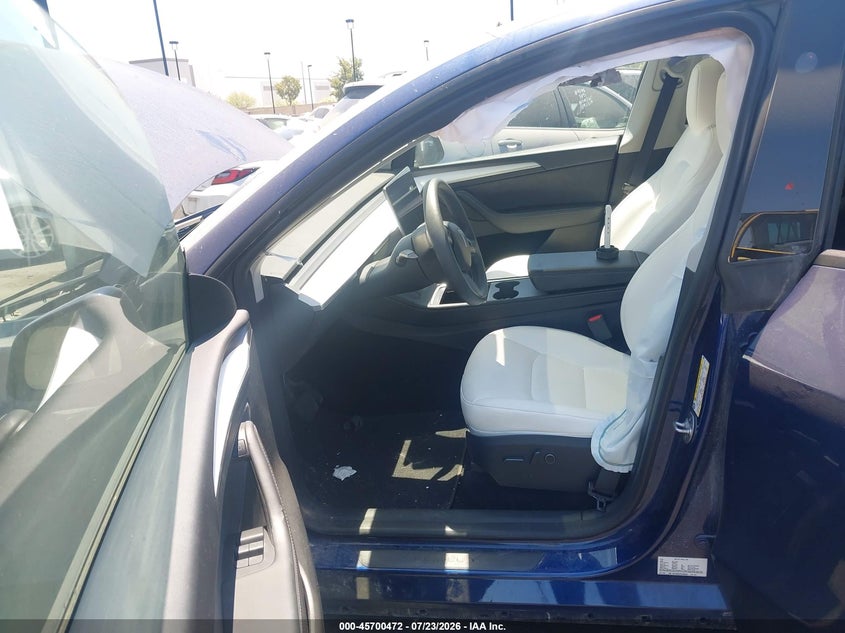2023 Tesla Model y VIN 7SAYGDED7PF955961 IAAI salvage auction — LEFT SIDE, Wait Title, sold $4,600 on 2026-09-07 (photo 5)