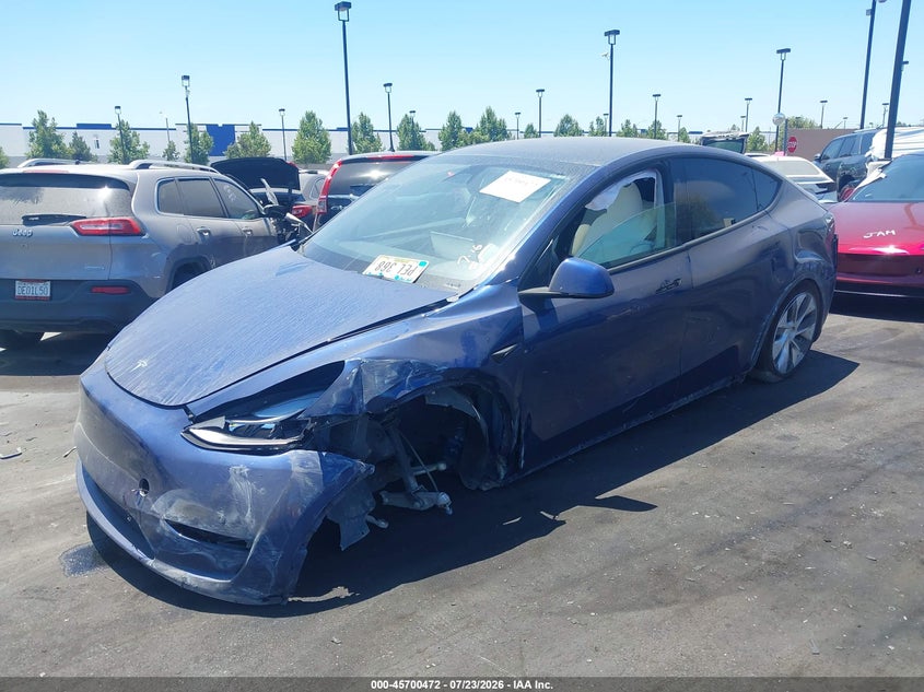 2023 Tesla Model y VIN 7SAYGDED7PF955961 IAAI salvage auction — LEFT SIDE, Wait Title, sold $4,600 on 2026-09-07 (photo 6)
